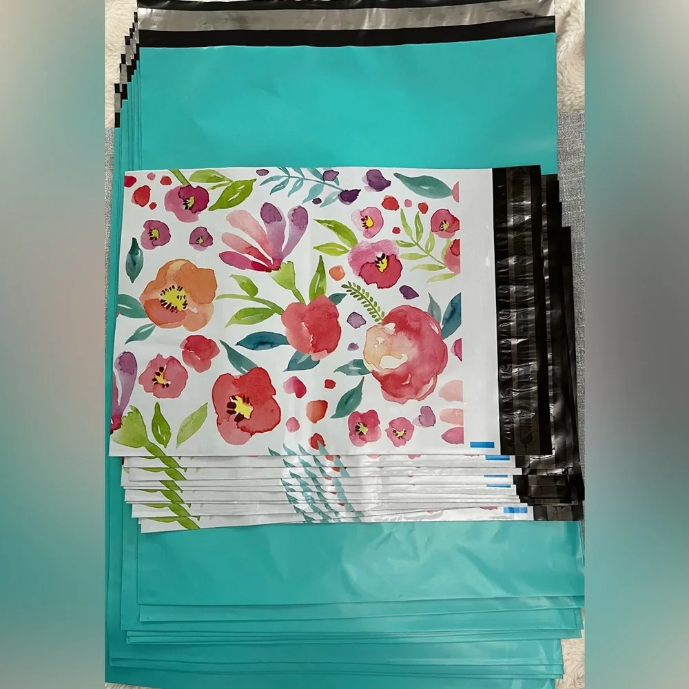 Floral & Teal Poly Mailers 10 each-20 total.Floral is 10”x13” Teal is 19”x 14.75